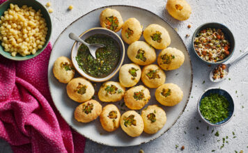 Delicious homemade Pani Puri recipe - Learn how to make the perfect crispy puris and tangy spicy pani for a mouthwatering Indian street food experience.