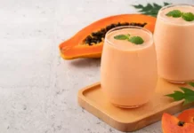 Refreshing papaya smoothie in a glass, perfect for a healthy breakfast or snack.