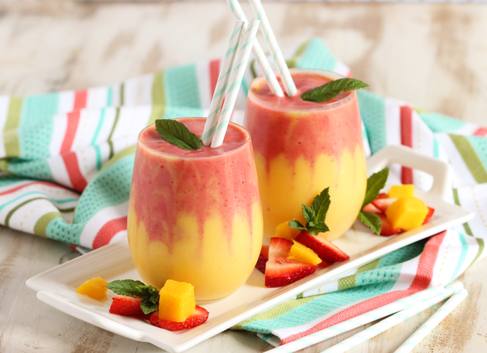 Refreshing Mango Banana Strawberry Smoothie: A vibrant blend of ripe mangoes, bananas, and strawberries, perfect for a healthy and delicious start to your day.