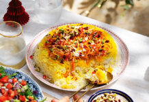 Exquisite Persian Jeweled Rice - A vibrant and flavorful dish adorned with a colorful array of nuts, fruits, and aromatic spices, perfect for special occasions. Indulge in this delightful Persian culinary masterpiece!